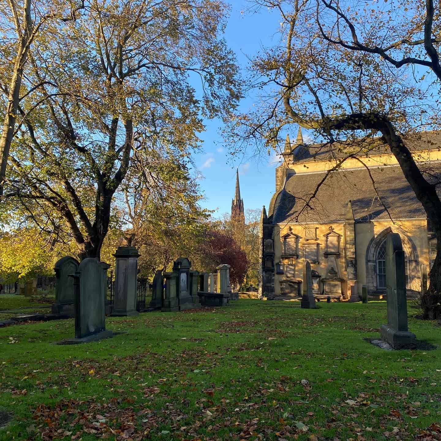 Edinburgh cemetery with fall colors and church 