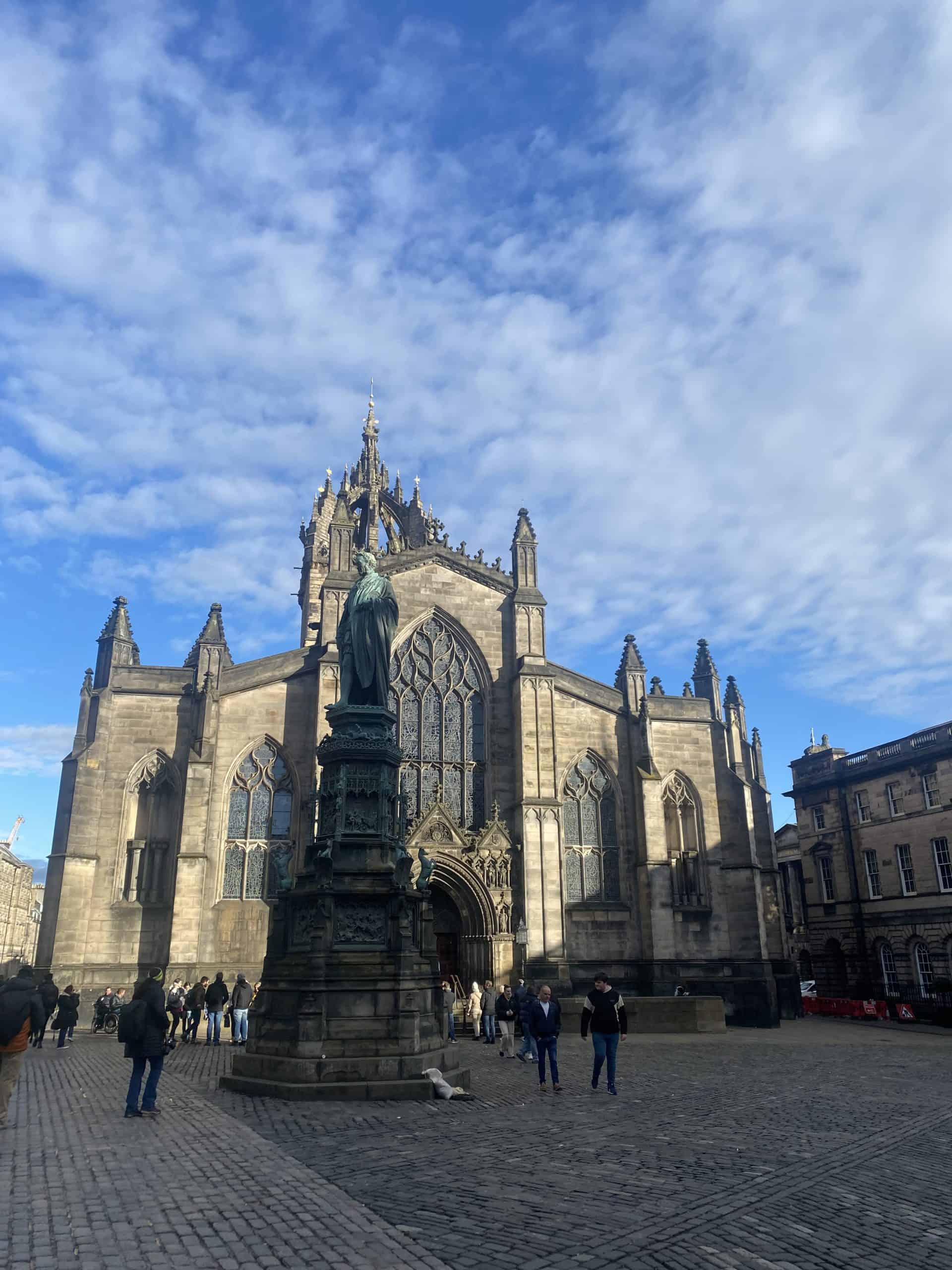 Visit the National Museum of Scotland with stained glass windows, statues in the courtyard