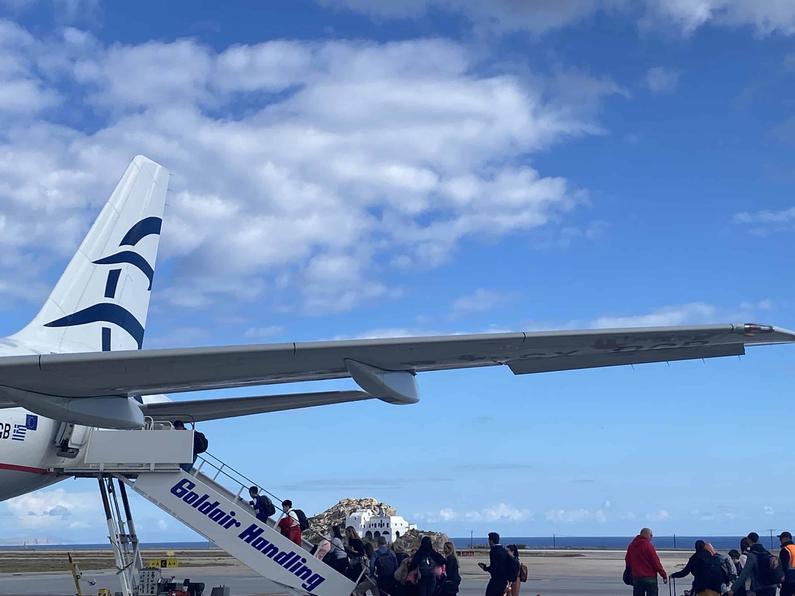 airplane with ocean in background 
