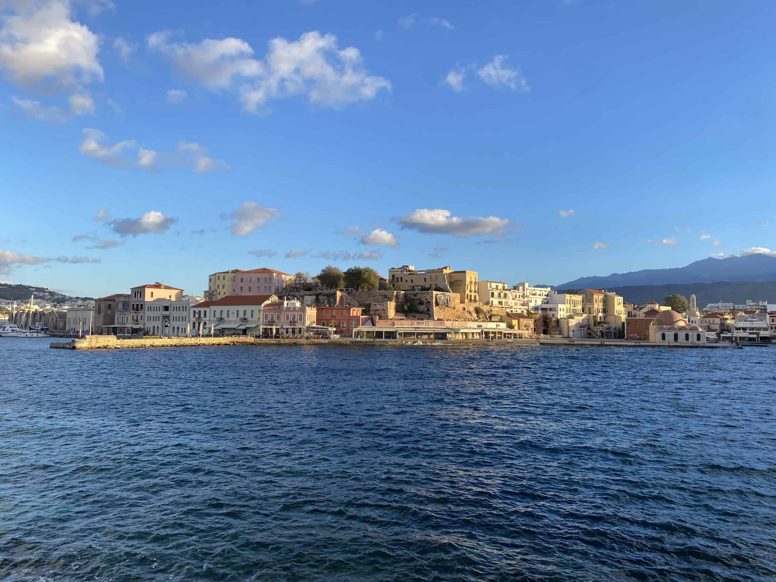 Harbor with city and mountains in the background 
