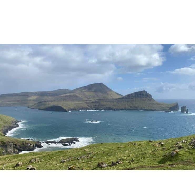Faroe Islands with ocean and green mountains 