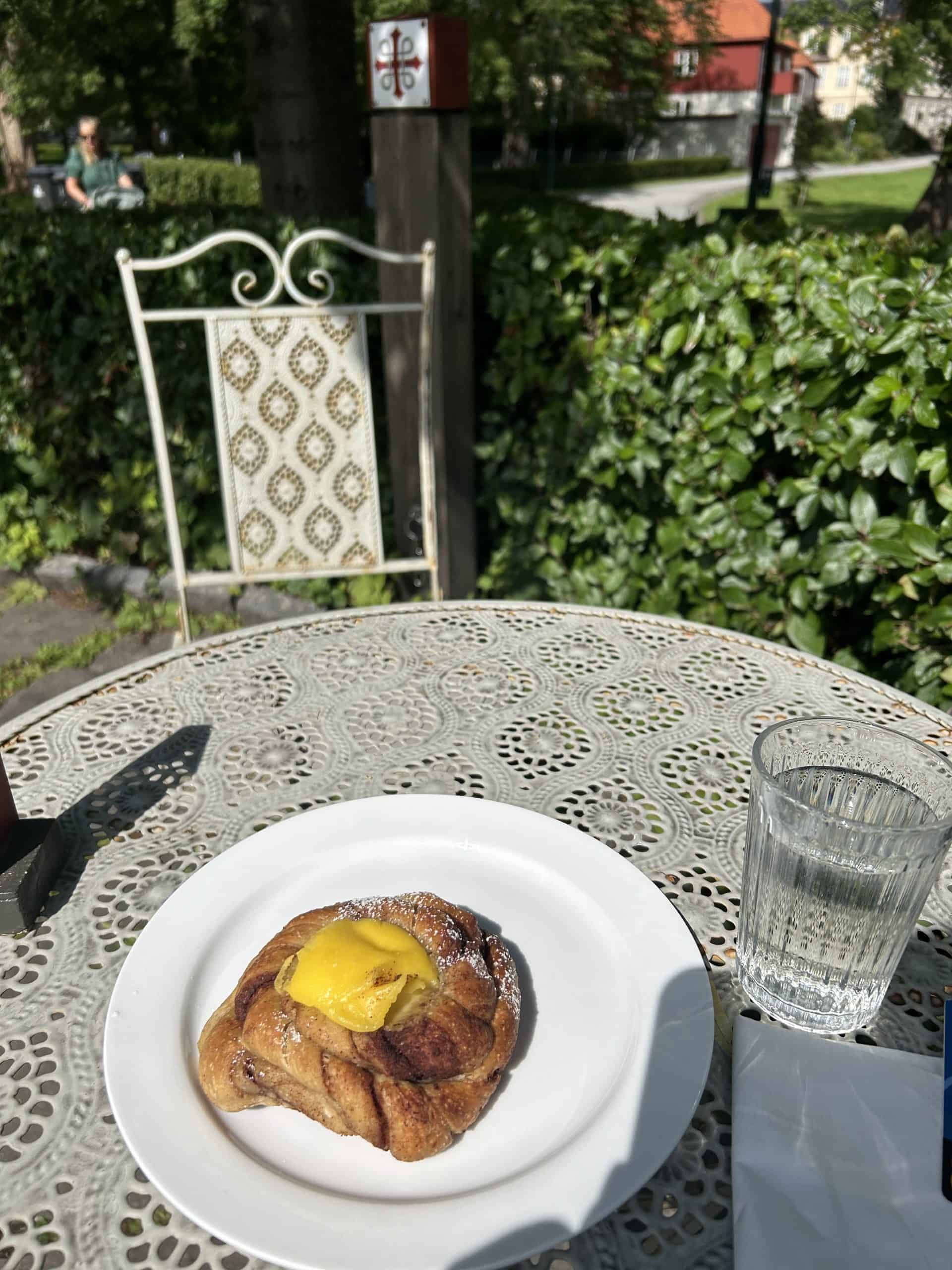 Cinnamon bun outside at Street cafe in Trondheim