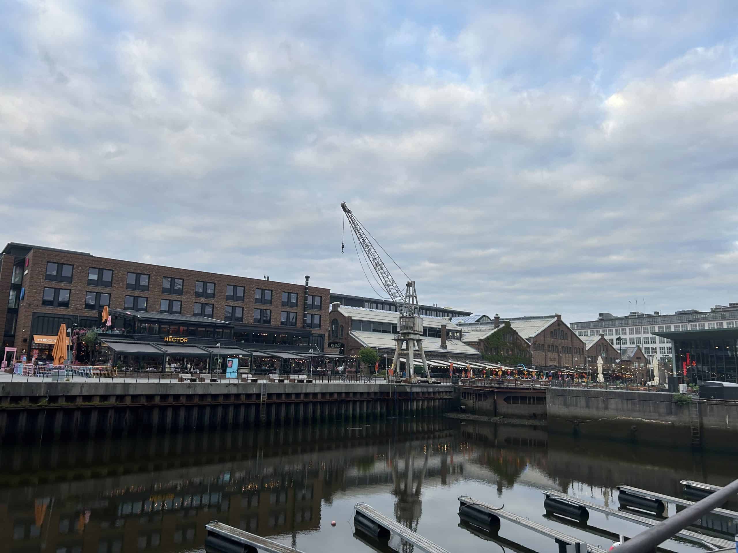 Warehouses and buildings refurbished as restaurants on the waterfront.